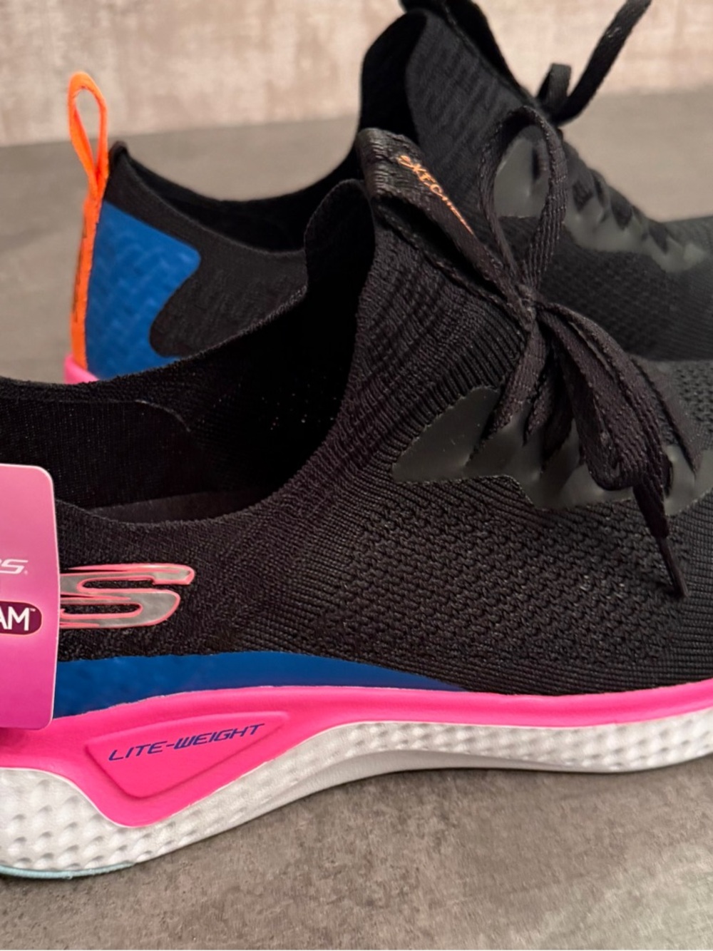 NWT Skechers Black Knit Slip-On Sneakers with Pink and Blue Accents